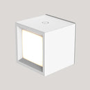 Cube-shaped ceiling light fixture on a gray background