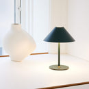 Rechargeable Halo Hygge Table Lamp on a table by a window