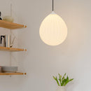 Umage Around the World Glass Lampshade in a kitchen next to some shelves.