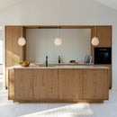 3 Umage Around the World Glass Lampshades above kitchen island