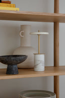 Asteria Move Mini Portable Table Lamp on a shelf in a kitchen