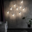 A collection of Clear and White Steel Umage Acorn Glass Lampshades Hanging as a statement collection