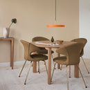 Umage Asteria Pendant Light above a dining table in Orange colour