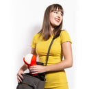 woman removing innermost portable bud lamp in fluro from her bag