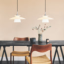 Halo Design Scandinavia Opal Glass Pendant Light cluster over dining room table and chairs