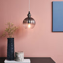 Halo Design Ball Pendant light in Smoke over chest of drawers