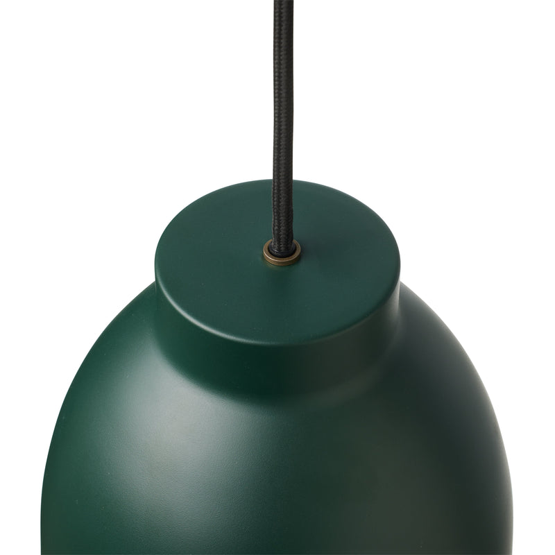 Green pendant light on a white background