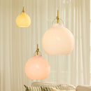 All three colours of Halo Design Toscana Glass pendant lights in living room