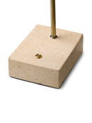 Beige concrete block with gold accent on a white background