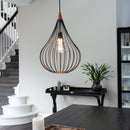 Halo Design Drops Dark Wood Pendant Light in living space