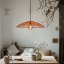 Thatch Dome Rattan Lampshade above a table