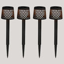 Four black outdoor solar lights on garden spikes with perforated design on a light gray background, featuring a recycling symbol.