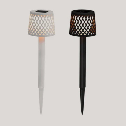 Two solar-powered garden lights, one white and one black, on a light gray background.
