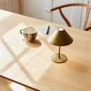 Rechargeable Halo Hygge Table Lamp on a dining table