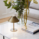 Rechargeable Halo Hygge Table Lamp on a coffee table 