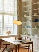 Halo Design Mesh Pendant Light in opal over kitchen table
