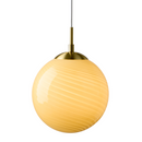 Halo Design Candy Ball Yellow Globe pendant light with gold fixture on a white background