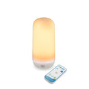 Smart night light with remote control on a white background