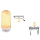 Futuristic cylindrical light with wall and table attachment options on a white background