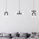 Robin Lamps Rigoberta Pendants in Matt Black hanging in modern living room