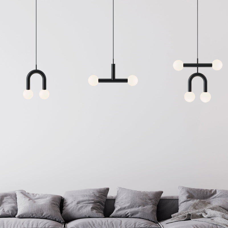 Robin Lamps Rigoberta Pendants in Matt Black hanging in modern living room