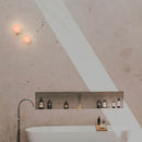 Robin Lamps Rock Wall Light in Black and Alabaster mounted in modern bathroom