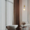 Robin Lamps Royal Single Arm Wall Light in Brass and Alabaster mounted in bright office 