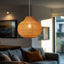 Thatch Jar Rattan  Lampshade by a sofa in a living room