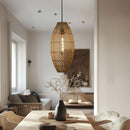 Thatch Cigar Rattan Lampshade above a dining table
