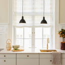 Cluster of Halo Design Metropole Pendant Light in Black over kitchen sink