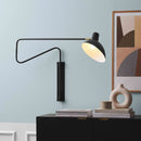 Halo Design Metropole Deluxe Wall Light in Small on wall next to unit