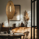 Thatch Cigar Rattan Lampshade above a dining table