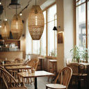 Thatch Cigar Rattan Lampshade above each table and chairs in a coffee shop