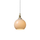 Halo Design Toscana pendant light in grey, small 18cm hand-blown glass sphere with antique brass fitting on white background