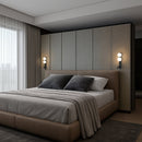 Robin Lamps Bubble wall light mounted in a dark bedroom interior showing warm ambient glow