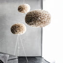 light brown Umage pendant lampshades hanging in a sleek modern room