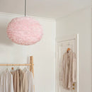 XLarge light rose Umage pendant lampshade hanging in a sleek modern closet