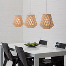 3 pilke wooden pendant lights in a dining room
