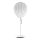 Around the world table lamp by Umage, inspired by the shapes of hot air balloons. A white glass lampshade and elegant Santé table base in white. A beautiful white table light
