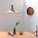 Umage Jazz Oak Wooden Lampshade over a dining table