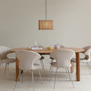 Umage Komorebi Wooden Lampshade over a dining table