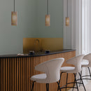 3 Umage Komorebi Wooden Lampshades over a breakfast bar in a kitchen