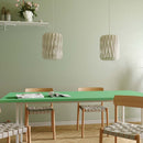 2 Pilke Signature 18 Wooden Pendant lights in White above a dining table