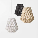 3 Pilke Wooden Pendant lights in white, Black and Natural Birch, hung together
