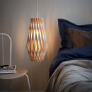 Pilke Signature 20-42 Wooden Pendant Light in Birch in a Bedroom