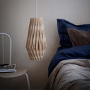 Pilke Signature 20-42 Wooden Pendant Light in a bedroom