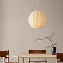 Large Fibre Silk Globe Lampshade by Shropshire Shades  hung on a ceiling light over a table and chairs