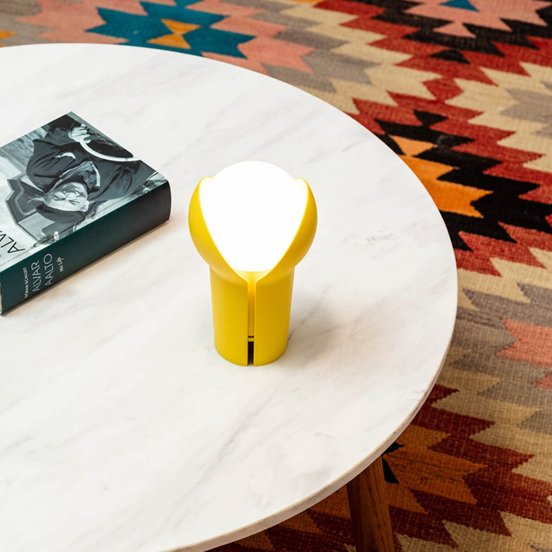 innermost portable bud lamp in lemon on a table