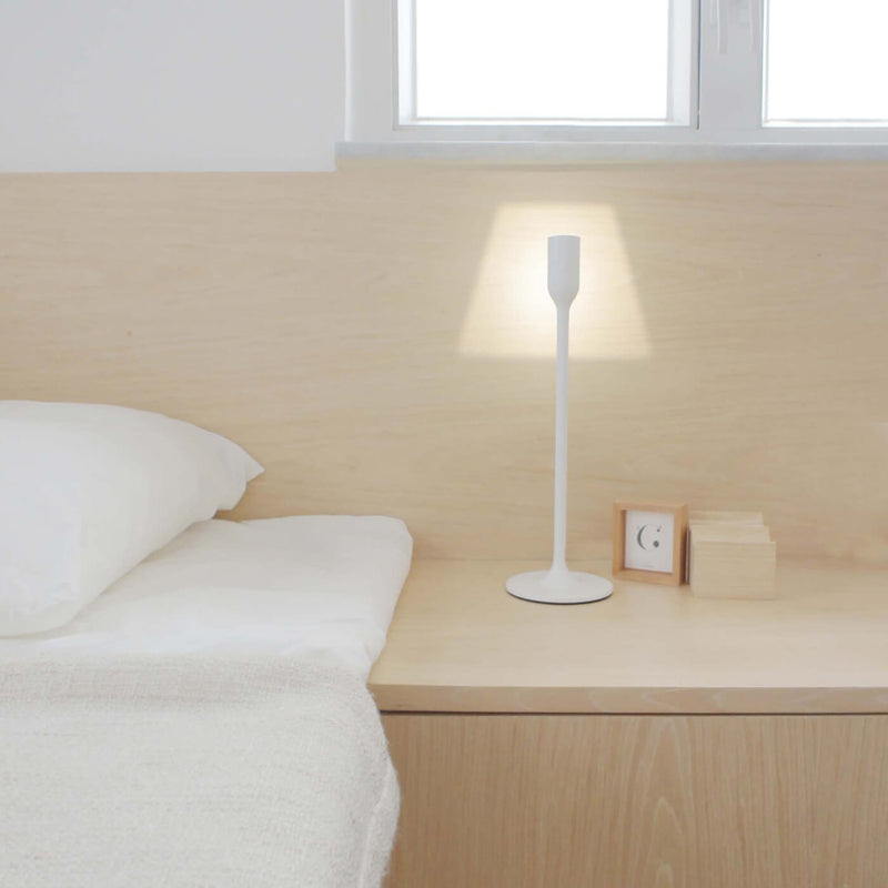 innermost yoy white table lamp at bedside