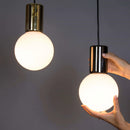 pearl drop led pendant lights in brass and gunmetal